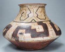 A Shipibo pottery water vessel with geometric pattern, Peru, 26cm tall