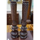 A pair of William mahogany 'bedpost' candlestands