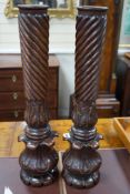 A pair of William mahogany 'bedpost' candlestands