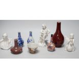 A Chinese sang de boeuf bottle neck vase, together with four Chinese miniature vases, three