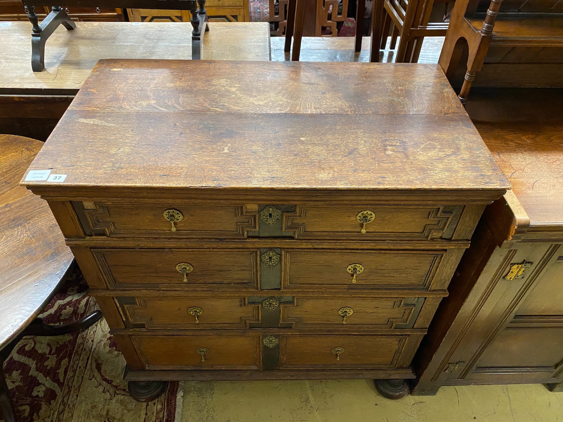 A 17th century style oak geometric four drawer chest, width 97cm, depth 54cm, height 99cm - Image 2 of 2