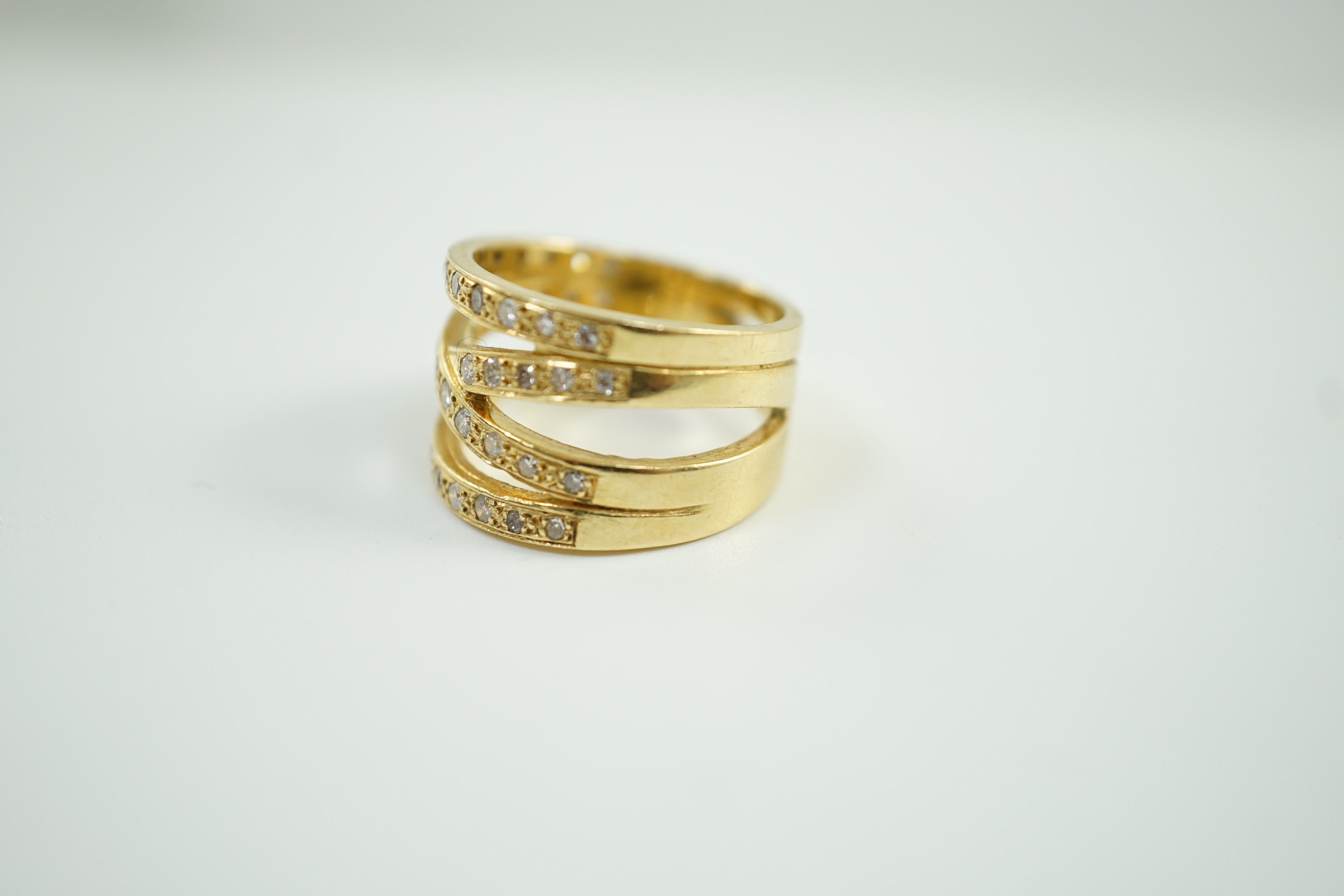A modern 750 and diamond chip cluster set multi shank dress ring, size P, gross 10.1 grams. - Image 2 of 6