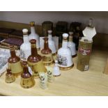 A group of Wade Bell's whisky (some with contents) and other bottles of spirits