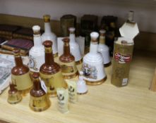 A group of Wade Bell's whisky (some with contents) and other bottles of spirits