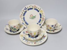 Jessie Marion King (1875-1949). Three different floral design tea cups, saucers and plates