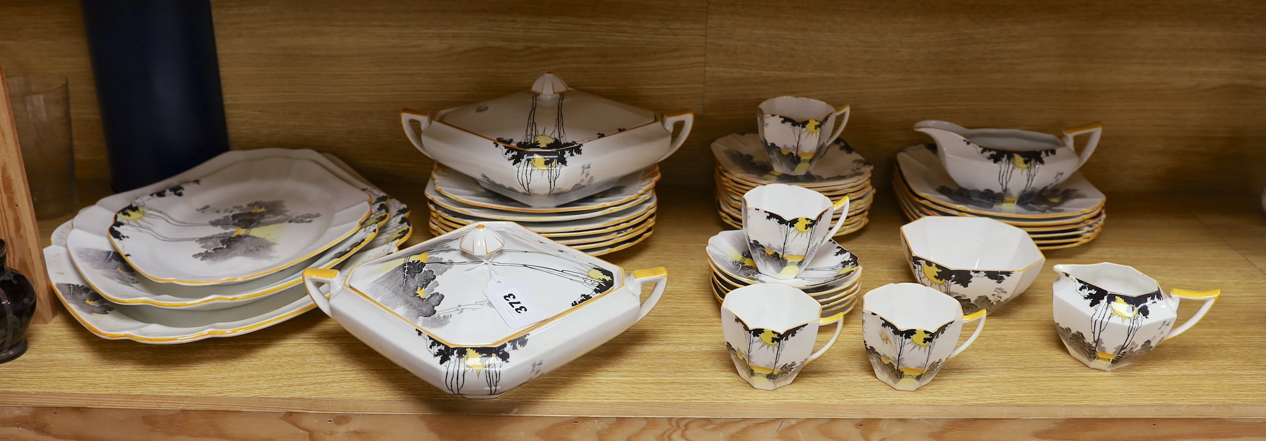 A 1930s Shelley Queen Anne shape Art Deco Sunshine and Tall Trees pattern tea and dinner wares,