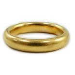 A 1930's 22ct gold wedding band, size M, 7.8 grams.