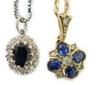 A modern 9ct gold, sapphire and diamond set pendant, overall 19mm, on a 375 chain, 38cm and a