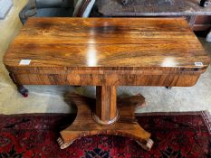 An early Victorian rosewood folding tea table, width 91cm, depth 45cm, height 76cm