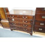 A George III and later mahogany dressing chest, the compartmented top drawer with sliding baize
