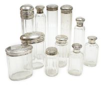 Forty four assorted silver or white metal mounted glass toilet bottles, tallest 18cm, a quantity