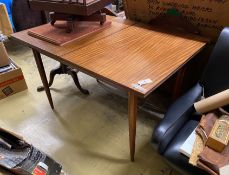 A mid century rectangular teak extending dining table by White and Newton, width 122cm, depth