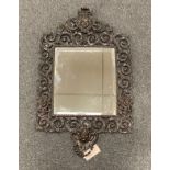 A late 19th century bronze wall mirror, 68 x 42 cm