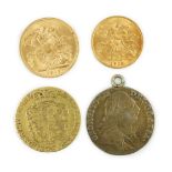 A George V 1915 gold sovereign and a 1915 gold half sovereign, a George III 1782 gold guinea(worn)