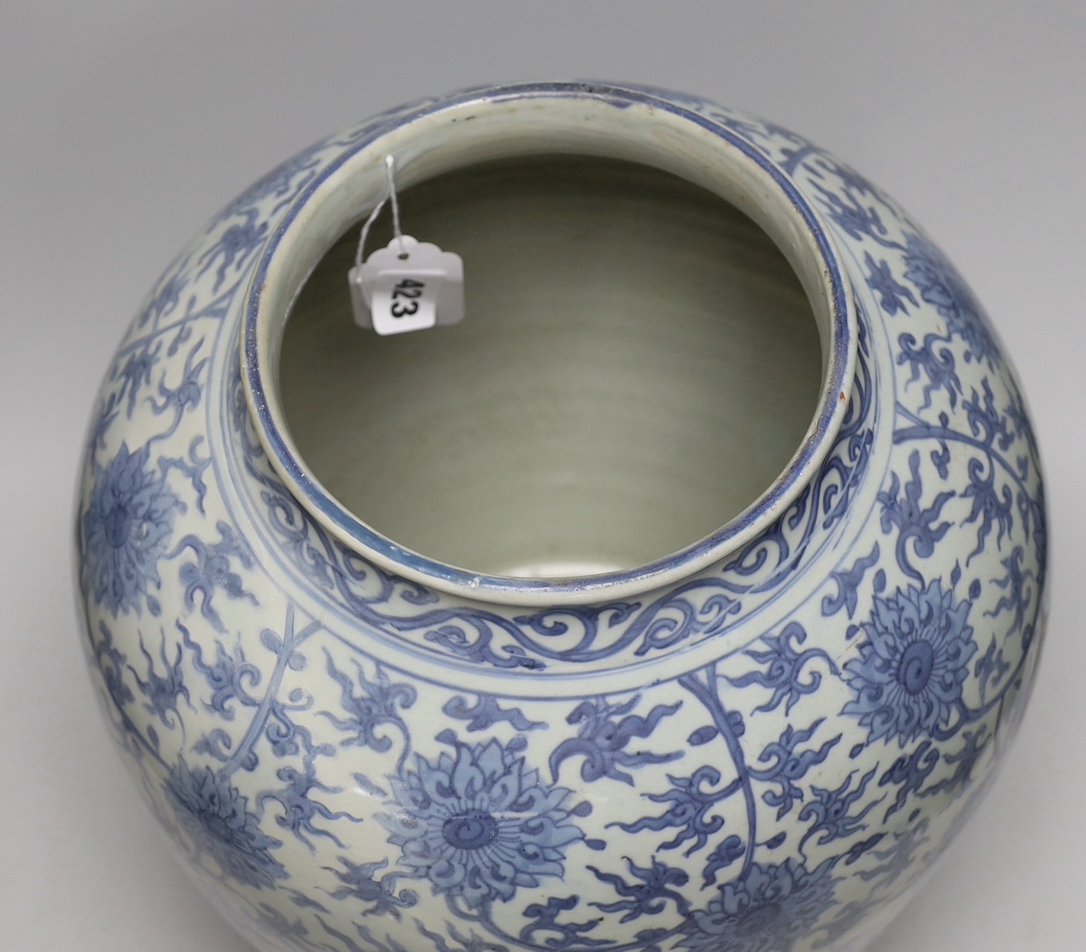 A Chinese blue and white 'lotus' jar, 17th century, 38cms high, restored - Image 3 of 4