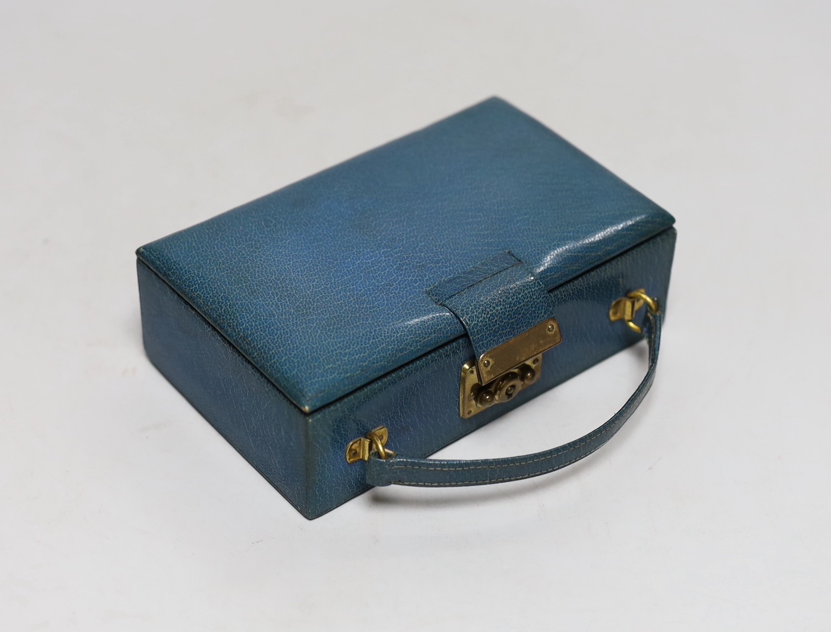 A lady's 1920's small leather vanity case, containing an enamelled comb, pill box and lipstick - Image 3 of 3