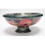A Moorcroft Pomegranate pedestal bowl, 1920s, 23.5cm diameter