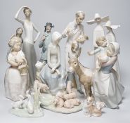 A collection of nine Lladro porcelain figures, tallest 36cm