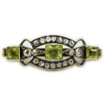 A late Victorian yellow metal, peridot and rose cut diamond set brooch, 31mm, gross weight 4.9