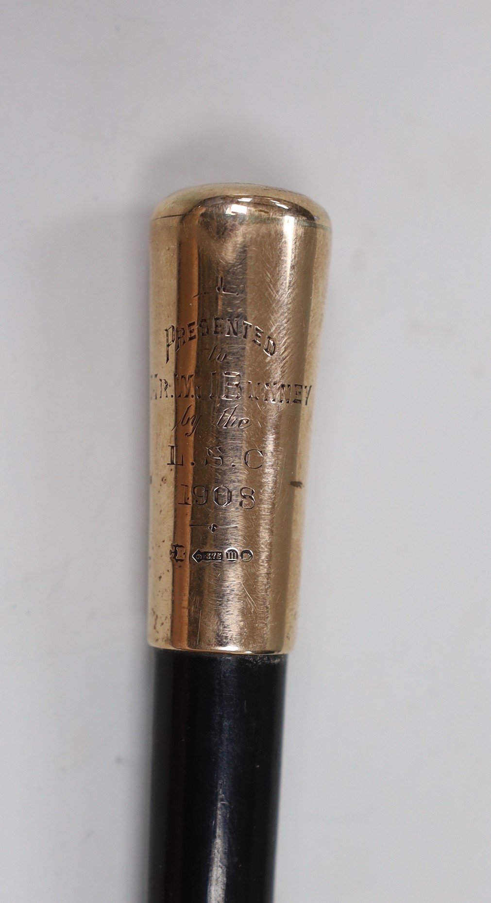 An Edwardian 9ct gold mounted ebonised baton, with presentation inscription to Mr. W.J. Bunny', - Image 2 of 3