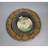 A Spanish Hispano-Moresque lustre charger, a Clarice Cliff Bizarre plate and a German bowl,