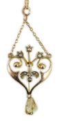An Edwardian 9ct, baroque and seed pearl set drop pendant necklace, 47cm, gross weight 4.3 grams.