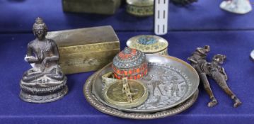 A group of Indian & Islamic items: an astrolobe, betel nut cutters, three bones and two dishes