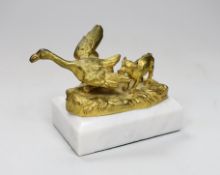 A gilt-bronze model dog and duck signed Mauroy, on marble base, 13.5cm long