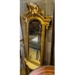 A Victorian giltwood and composition girandole pier glass, width 56cm, height 145cm