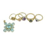 Four assorted modern 9ct gold and gem set rings, a white metal and seed pearl ring and a 9ct gold