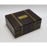 A Victorian brass bound rosewood toilet box, with contents, 21cms deep x 27cms wide