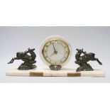 An Art Deco spelter mounted deer marble mantel clock, 47cms wide