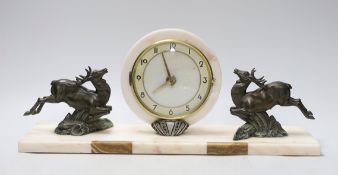 An Art Deco spelter mounted deer marble mantel clock, 47cms wide