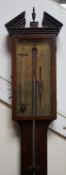 A George III mahogany stick barometer, the engraved brass dial marked Dangelo, Basingstoke, height
