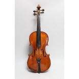 A cased 19th century French violin, back 34cm