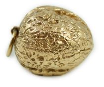 A modern 9ct gold novelty locket pendant, modelled as a walnut, 28mm, 26.7 grams.