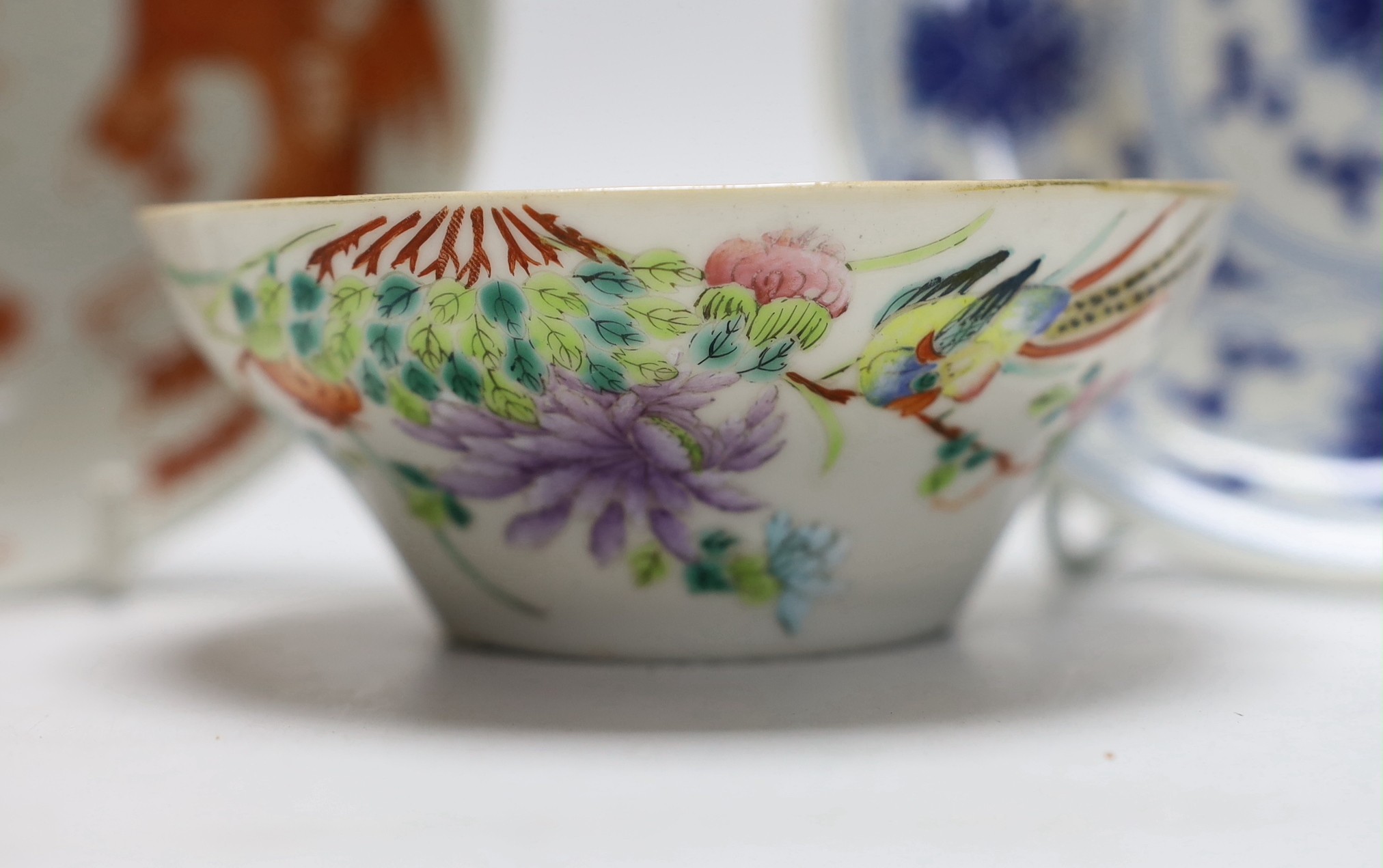 A Chinese blue and white saucer, together with a ‘dragon and phoenix’ saucer and a famille rose - Image 2 of 6