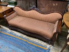 A 19th century Continental carved mahogany framed serpentine settee, length 190cm, depth 62cm,