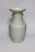 A Chinese celadon glazed vase, 19th century, 33cms high