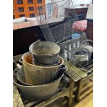Eight assorted galvanised buckets, tubs and watering cans and a wirework rack