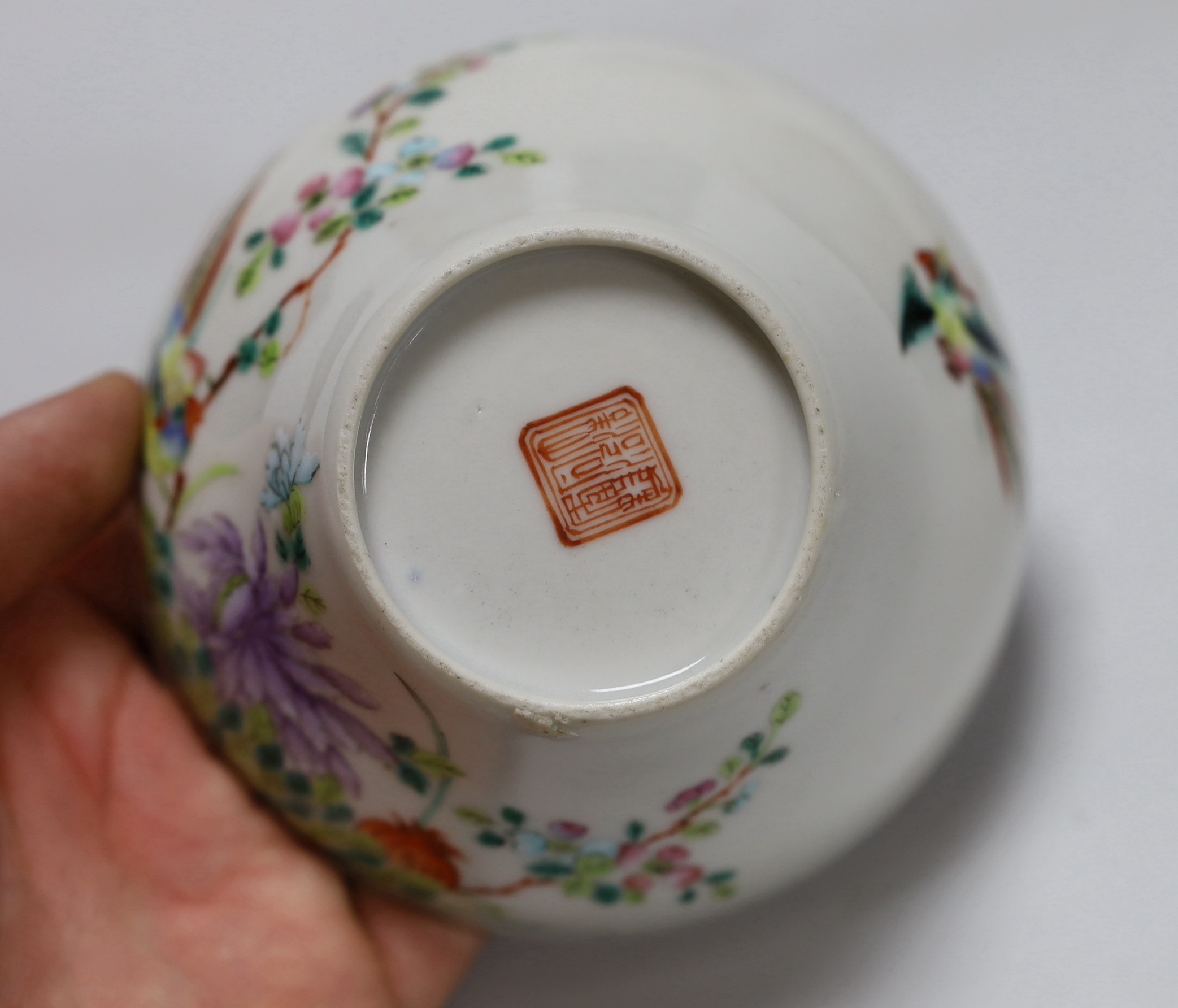 A Chinese blue and white saucer, together with a ‘dragon and phoenix’ saucer and a famille rose - Image 4 of 6