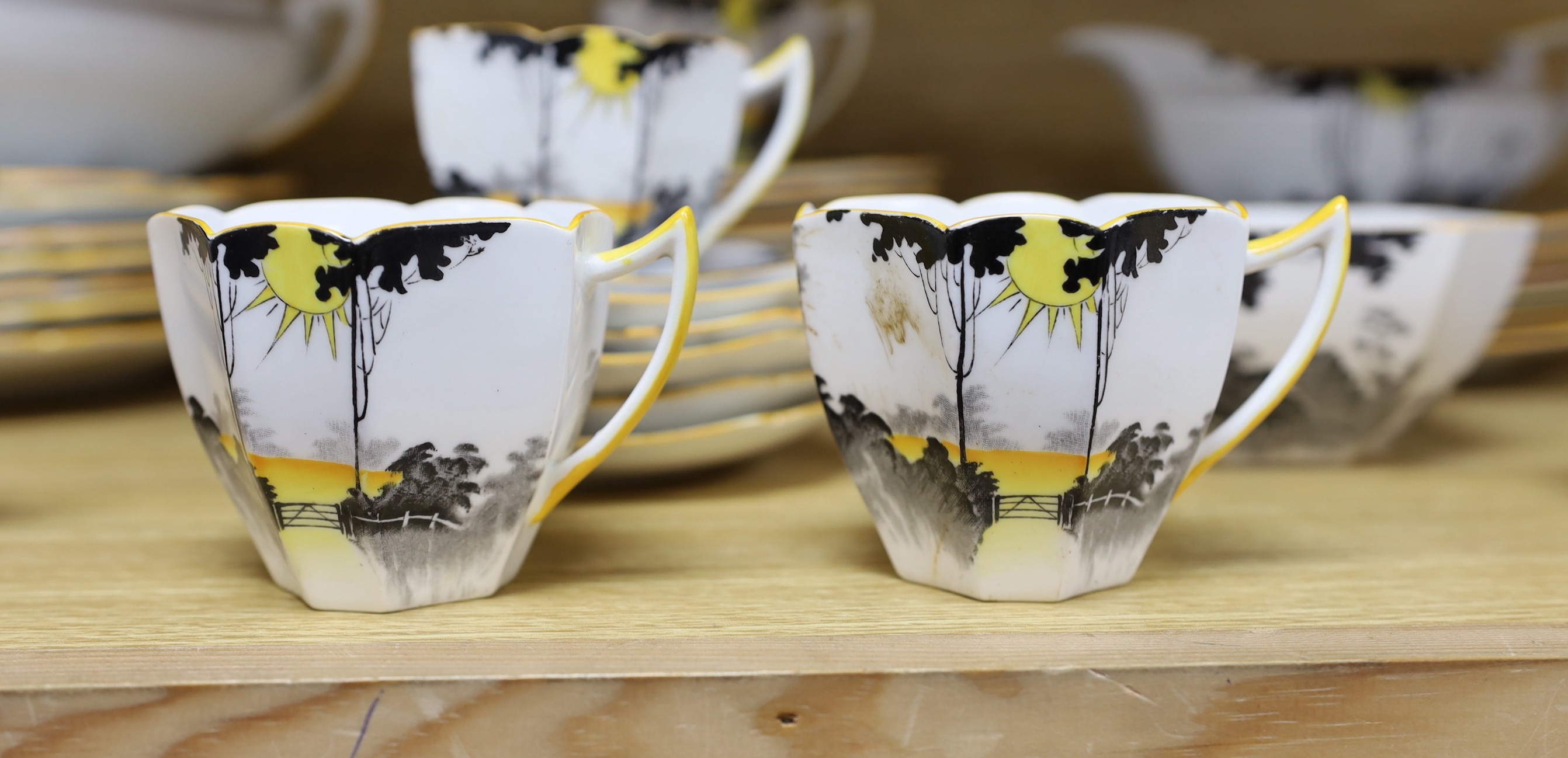 A 1930s Shelley Queen Anne shape Art Deco Sunshine and Tall Trees pattern tea and dinner wares, - Image 2 of 5