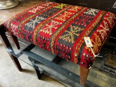 A rectangular Kilim upholstered foot stool, width 82cm, depth 56cm, height 35cm