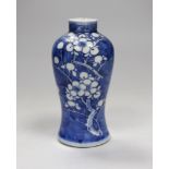 A 19th century Chinese blue and white prunus vase, 13.5cm tall