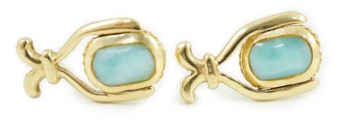 A modern pair of 14k and hardstone? set swivelling earrings, 17mm, gross weight 3 grams.