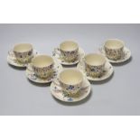 Jessie Marion King. A set of six floral teacups and saucers