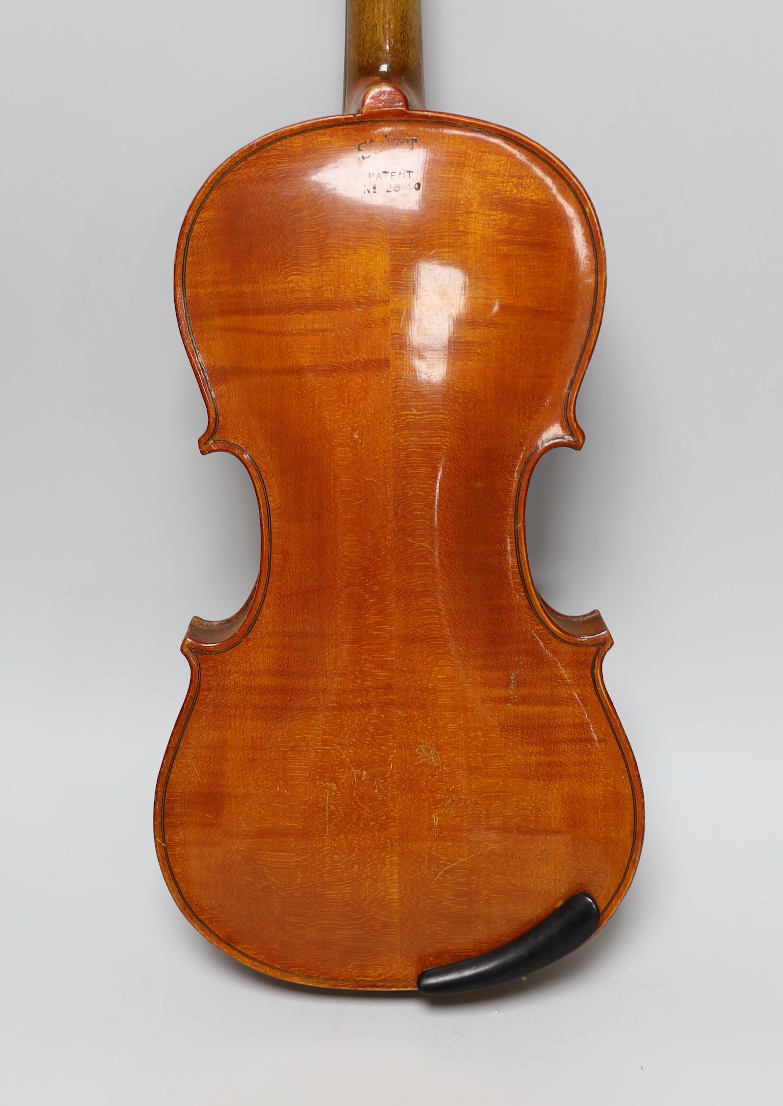 An early 20th century Stainer violin, patent number 23140, back measures 36.5cm excl button. cased. - Image 7 of 7