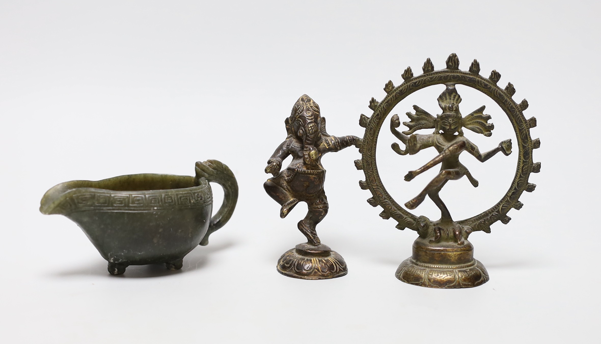 Two Indian bronze deity figures together with a Chinese carved spinach jade jug, tallest 11cm