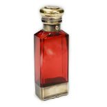 A late Victorian silver gilt mounted ruby glass combination scent bottle/vinaigrette, by Sampson
