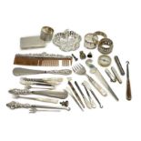 A group of assorted small silver and white metal items, including a small late Victorian clover